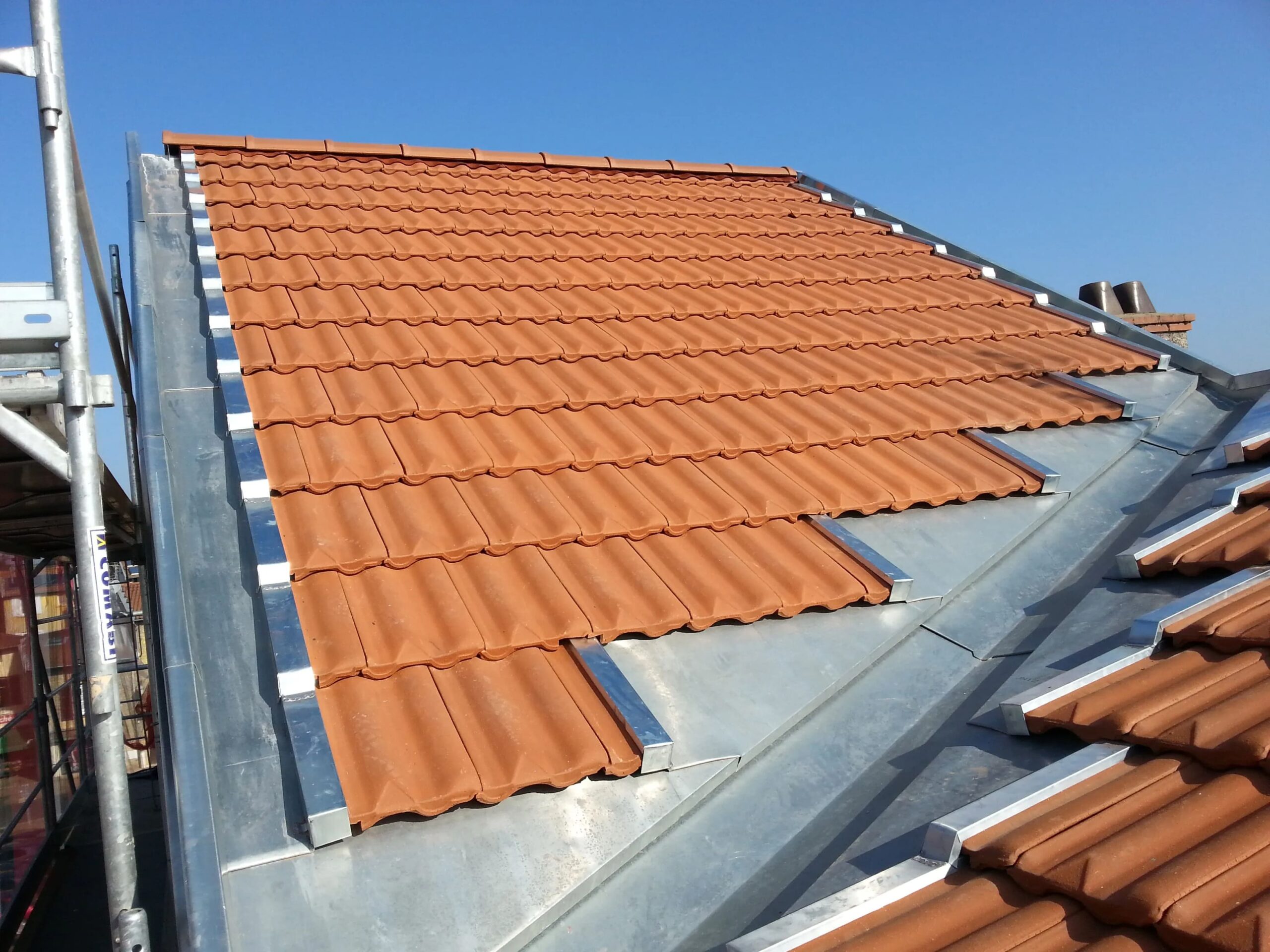 Travaux de rénovation et zinguerie réalisés à Versailles (78) par WRT Couverture.